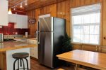 Cute Kitchen with stainless Refrigerator